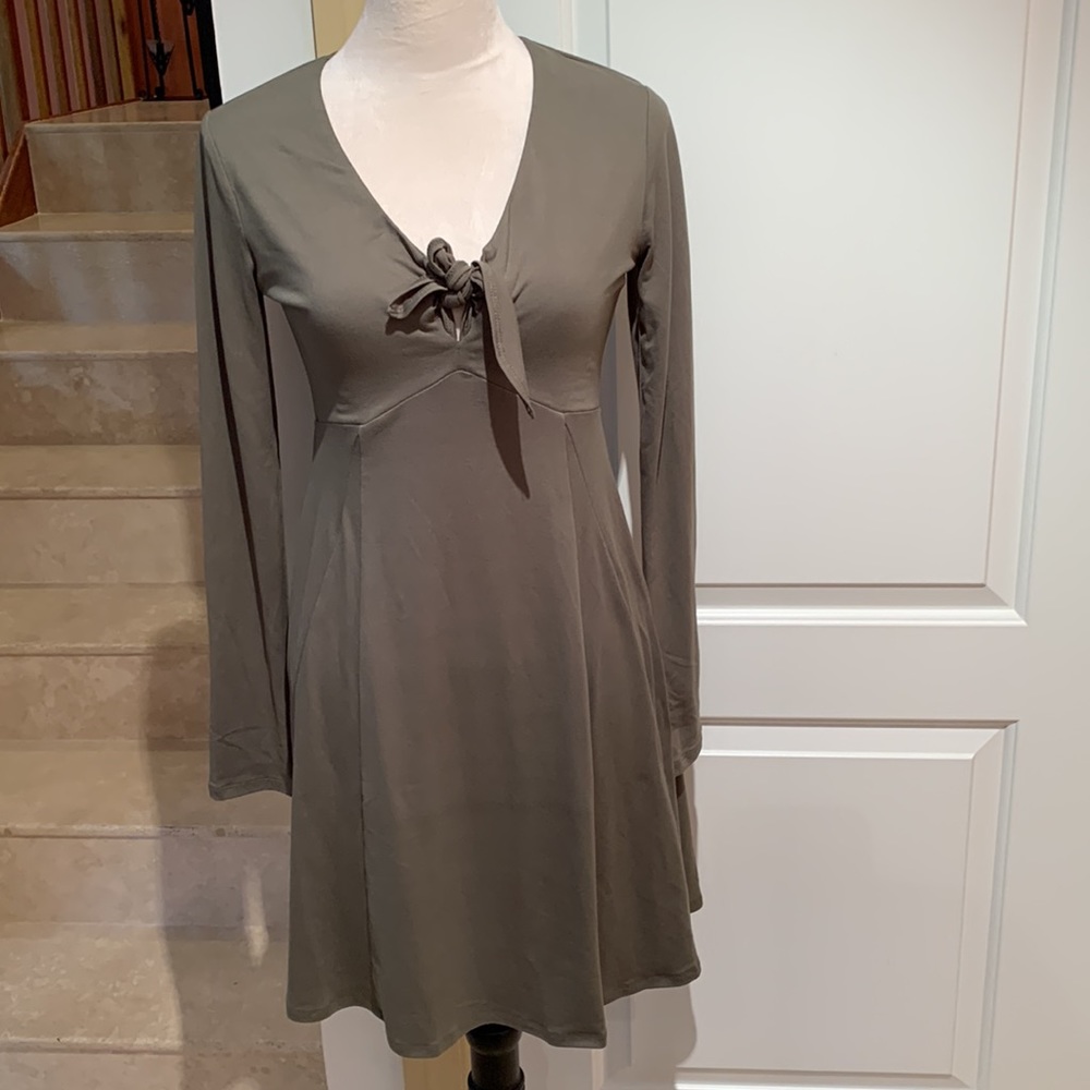 GB.  Olive‎ color. Tie Front, long sleeve mini dress. Size Small. Cut out…